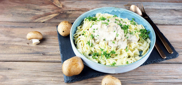 Selbstgemachte Tagliatelle mit Champignon-Creme
